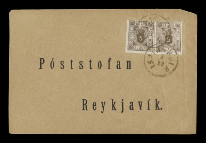 O5, 1878 5a Brown official, two copies, both with fine centering, tied to a very rare cover by two strikes of provincial Isafjordur3.12 town c.d.s., sent to a printed address
in Reykjavik, postmasters fancy oval Isafjordur crown and postho