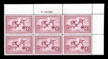 RW2, 1935 $1.00 Rose lake, top right margin plate no. F131981 block of six, well centered, strong bright color, o.g., a few h.r.s and some rejoined perfs. in the top selvage,
very fine a highly collectable example of this scarce plate block.