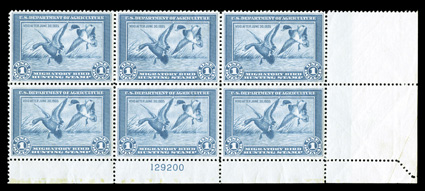 RW1, 1934 $1.00 Blue, bottom right margin plate no. 129200 block of six, well centered, rich fresh color, o.g., n.h., usual mild natural gum creases, crease in the bottom right
selvage causes irregular perforations, very fine overall a handsome