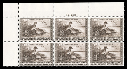 RW6, 1939 $1.00 Chocolate, top left margin plate no. 141428 block of six, nicely centered, fresh, o.g., n.h., faint natural gum bends and some trivial gum skips in the left
selvage only, very fine.