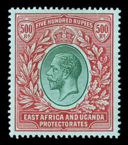 S.G. 63, 1912 500R Green and red on green, incredibly well centered, rich vibrant colors that are completely unrubbed, well incised impressions, full o.g. that is relatively
lightly hinged, extremely fine.The Five Hundred Rupee is one of the r