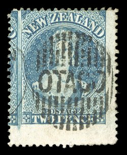 2d. dull deep blue, a very large example with huge margins at right and at foot, and with portion of adjoining stamp with burr rubbing at left, neatly cancelled with otago in
bars a remarkable stamp. R.P.S. Certificates (1939 and 2000).