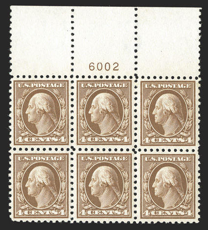 427, 4c Brown, a phenomenal full top margin plate no. 6002 block of six, incredibly well centered throughout, with each stamp being impeccably well centered amid large balanced
margins, rich color on fresh paper, o.g., top center stamp l.h., the