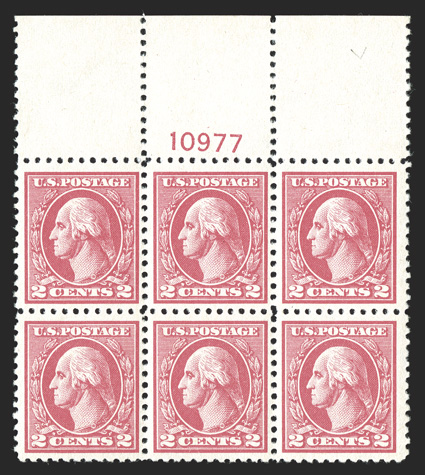 527, 2c Carmine offset, Ty. V, full top margin plate no. 10977 block of six, wonderfully well centered, bright and fresh, with crisp and intact perforations, o.g., l.h., right
pair n.h., extremely fine.