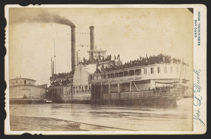 SS Sultana Disaster Outstanding cabinet card Photograph printed by James L. Duck of Caro and Sebewaing, Mich,  showing the SS Sultana, a steamer, laden with thousands of men at
Helena, AR, on April 26, 1865. A long description in