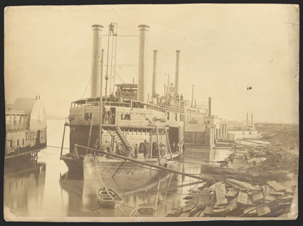 Vicksburg: USS Switzerland Four war-date Photographs, two of them cartes-de-visite the other pair panel photographs of 8 x 11 and 6.5 x 8.4. The largest shows the converted
paddle-wheel boat at Mound City, IL for repairs. The other p