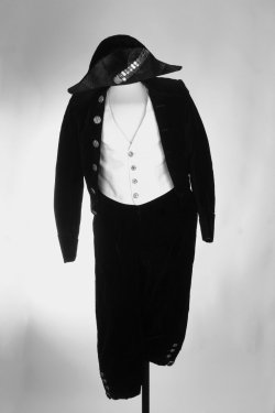 Nineteenth century Scottish Rite Masonic uniform, featuring an ornamental sword with scabbard and clip, made by McVicar and Middleton of London with etched blade, uniform
consists of a beaver hat, velvet coat and pants, as well as a white vest an